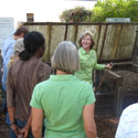 Extension agent demonstrates composting