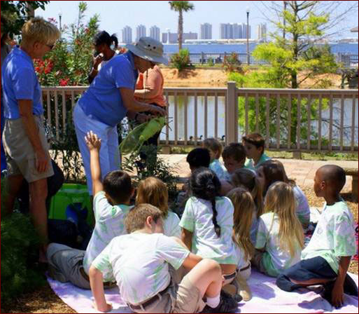 Master Gardener volunteers teaching "Kiderpillar"