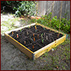 raised bed divided into sixteen squares