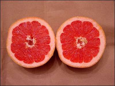 Pink grapefruit cut in half