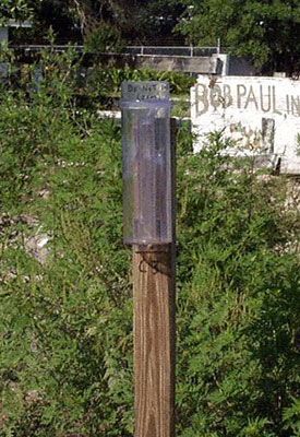 A rustic rain gauge