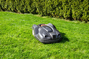 A  robotic gray mower with no handlebar