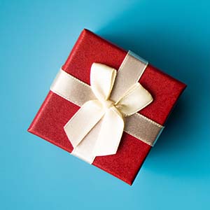Red box with gold ribbon bow
