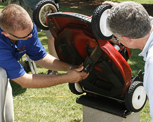 Taking the blade off a mower