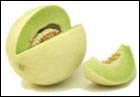 A honeydew melon cut open