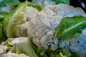 Cut heads of white cauliflower
