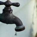 Photo of dripping faucet by Dave Gostisha