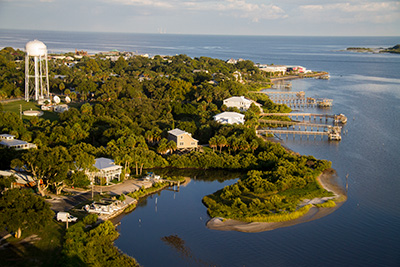 An aerial view of the Cedar Key coastline; more green than beaches.