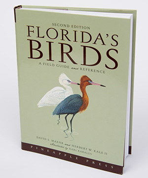 The cover of a book titled Florida's Birds: A Field Guide and Reference with an illustration of two wading birds.