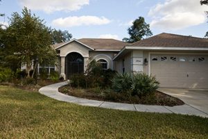 A Florida-Friendly home lawn in winter with dormant turfgrass.